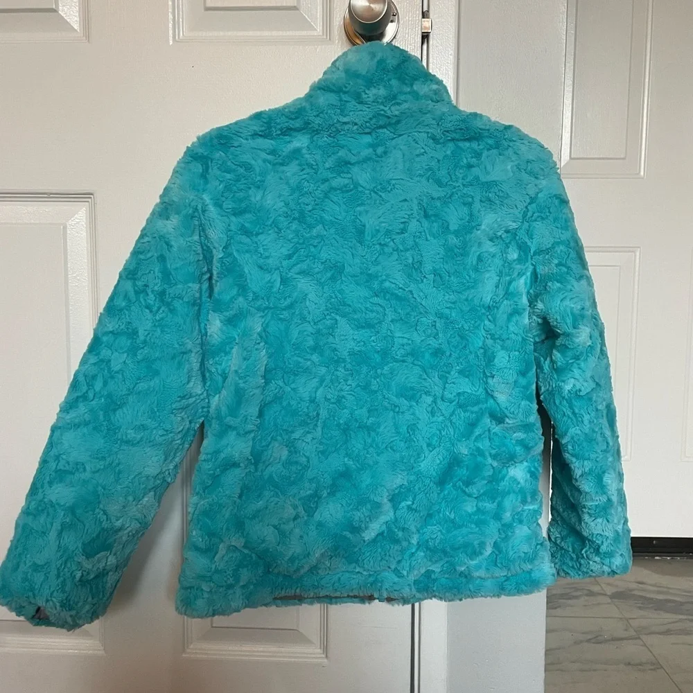 North face reversible puffer fleece jacket Girls size L (14/16)